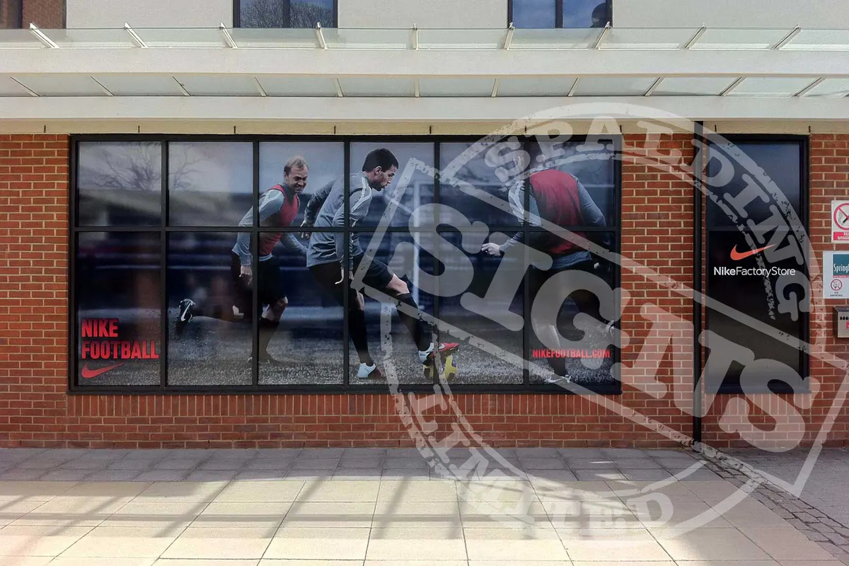 Nike Factory Store window graphics fitted across a shopfront